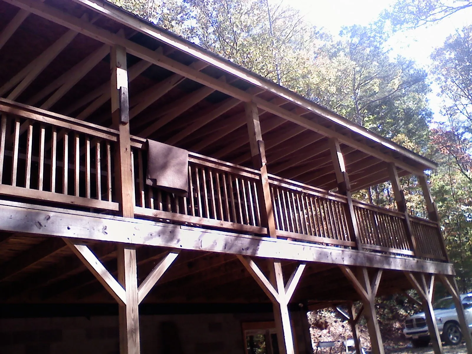 Timber framing under a new elevated porch and deck — Roof Leak Repair in Parkhill by Roofing Brothers
